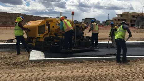 Asphalt Road Construction with Vehicle - Apex Pavement Solutions