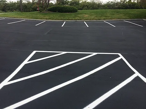 Asphalt Pavement With White Lines Painting - Apex Pavement Solutions